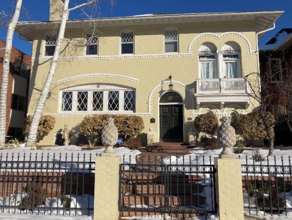 Front of the house viewed from Race Street (note pineapples on front gate!)