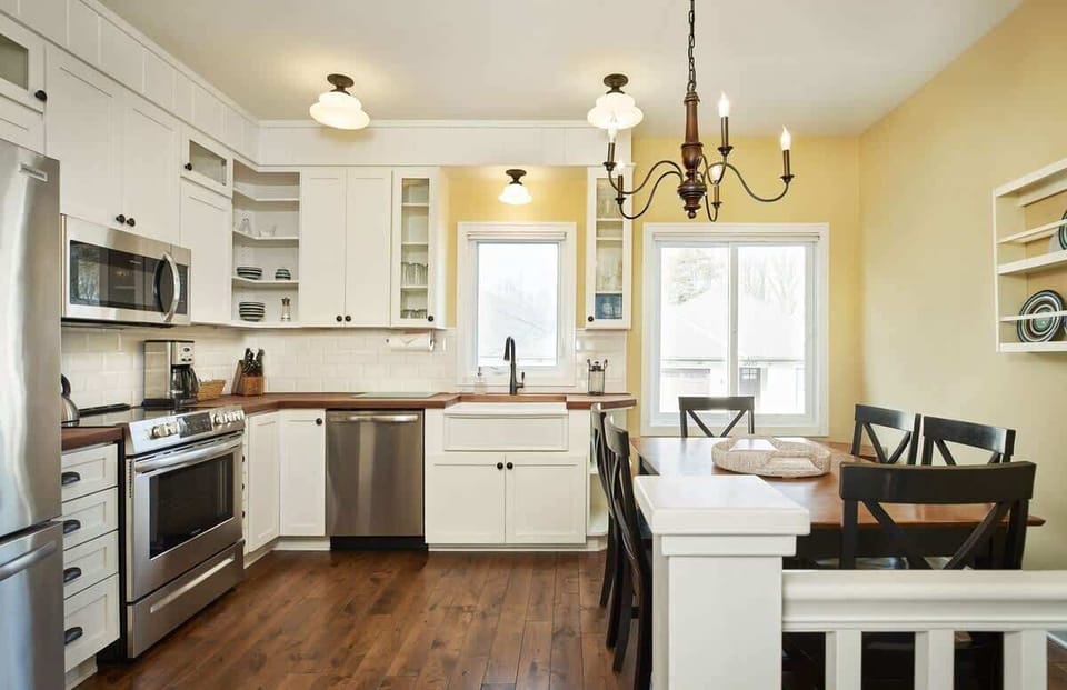 Kitchen on second floor, includes full fridge, dishwasher, oven, stove, microwave and sink