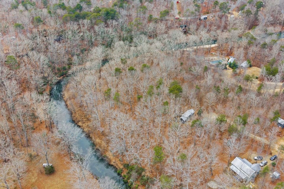 Surrounded by forest and calm water views, this home offers the kind of quiet setting that makes it easy to slow down.