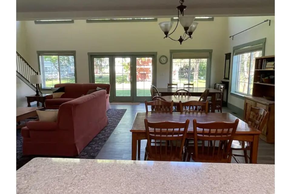 Great room adjacent to kitchen with dining area and family room.