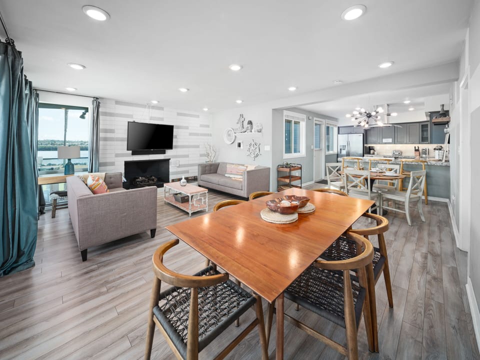 The second, larger table provides ample seating, making it perfect for accommodating larger groups.