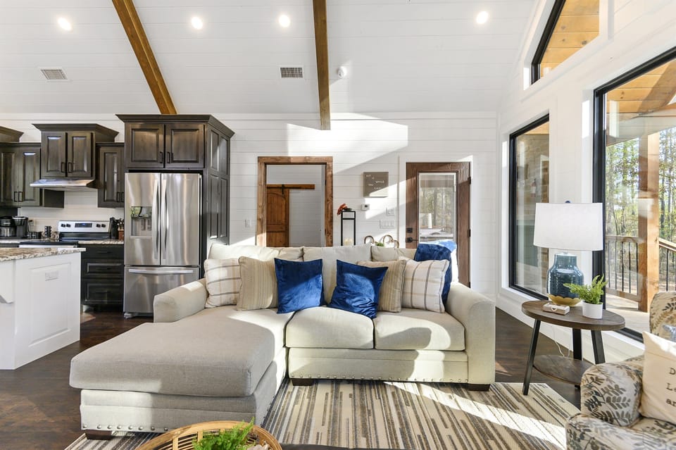 Living Room: Sun-soaked retreat with stylish decor, perfect for relaxation or gathering with friends!