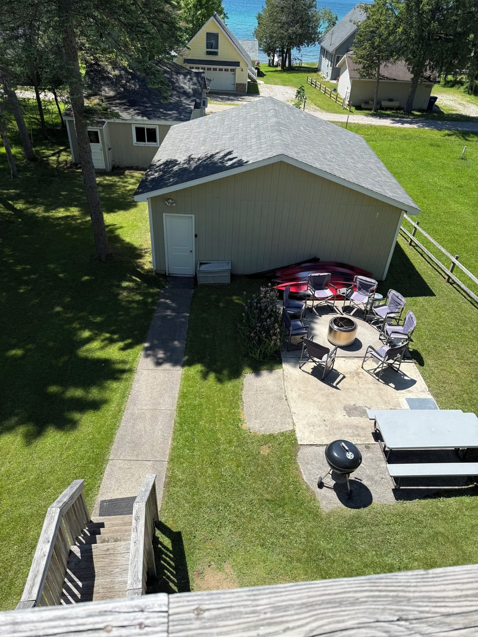 Backyard with kayaks, fire pit, camp chairs
