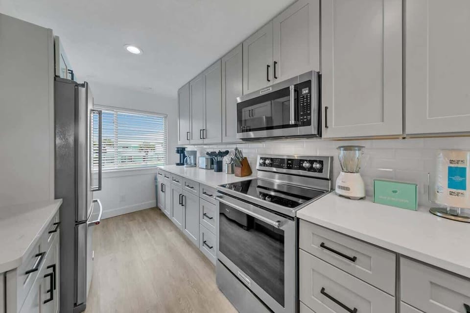 The Newly Remodeled Kitchen Features Stainless Steel Appliances and High End Finishes. 