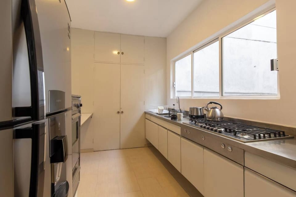 The kitchen is designed to be spacious and comfortable, ensuring a delightful cooking experience