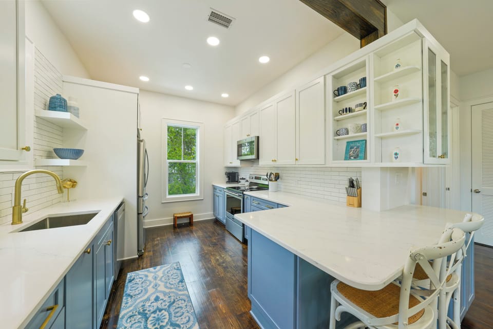 KITCHEN VIEW, ALL STAINLESS APPLIANCES, CUSTOM BUILT IN CABINETS