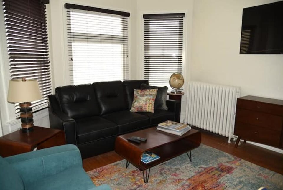 Enjoy stylish furniture in spacious living/dining room.  55 "  wall mounted TV
