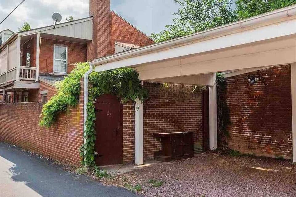 1 OFF-STREET COVERED PARKING SPACE