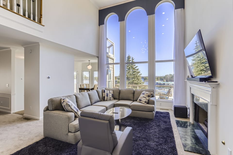 Living room with views of Lake Lanier and the marina. 
