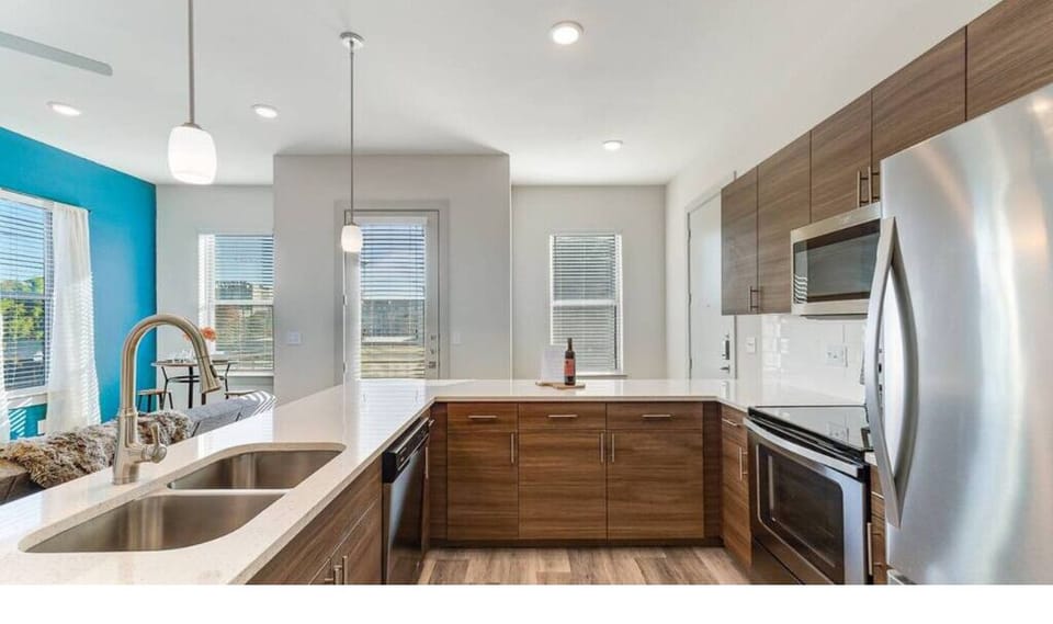 Big, sleek modern kitchen with all the amenities! Look at all that counter space
