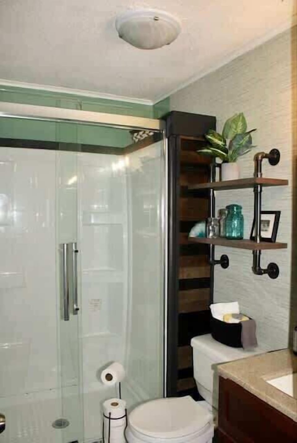 Refresh and rejuvenate in the bathroom with walk-in shower and all bathroom essentials.