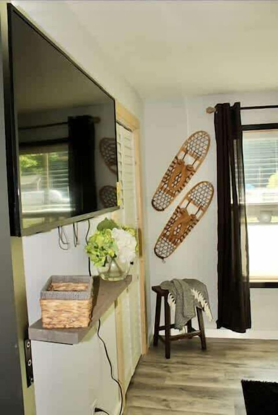 In the living room of this quaint, newly updated cottage, enjoy your favorite shows, movies, and sports on the 50" smart TV, accessing host-provided Sling or using your own log-ins to watch other popular streaming channels.