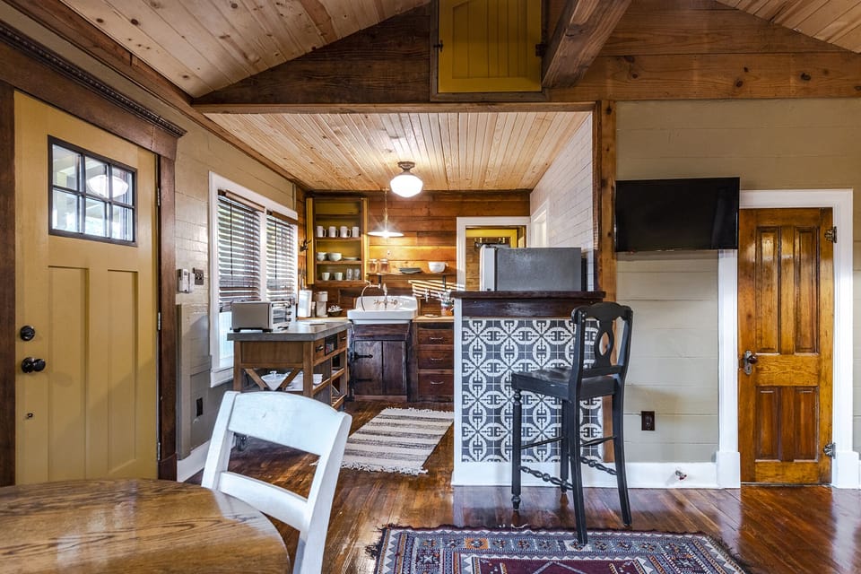 A breakfast bar offers a great place to have coffee.