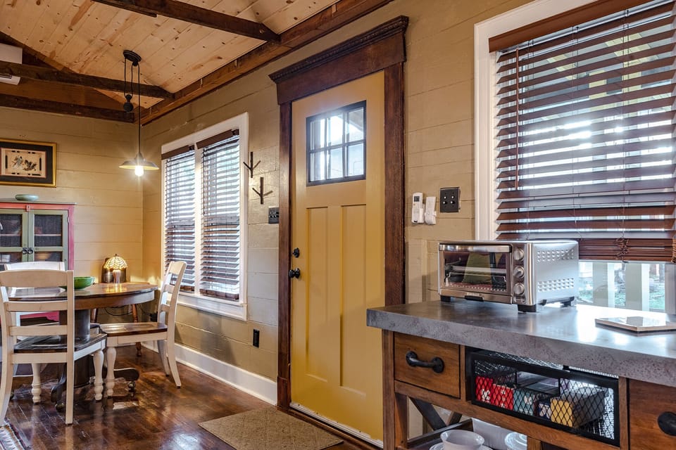A Craftsman-style front door opens to a cozy space.