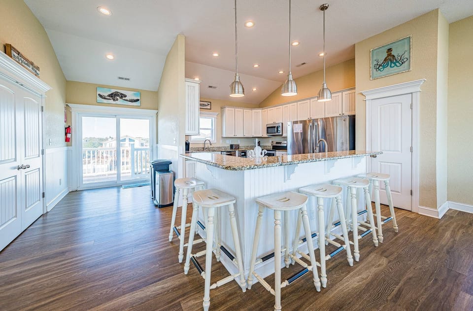 Large Kitchen w/2 Refrigerators, 4 Ovens, 2 Stoves, and 2 Dishwa