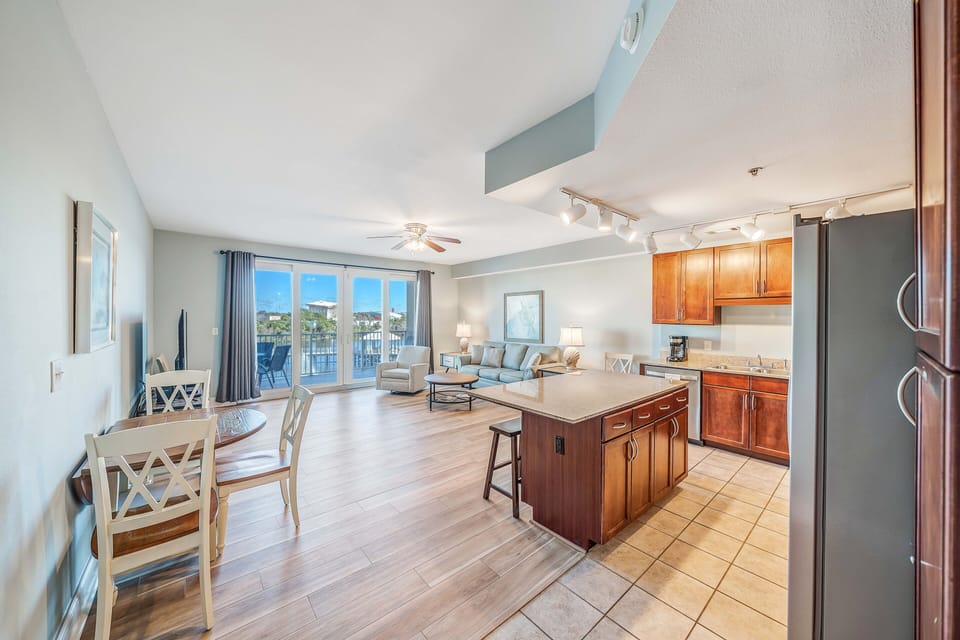 Open concept kitchen/dining/living area.