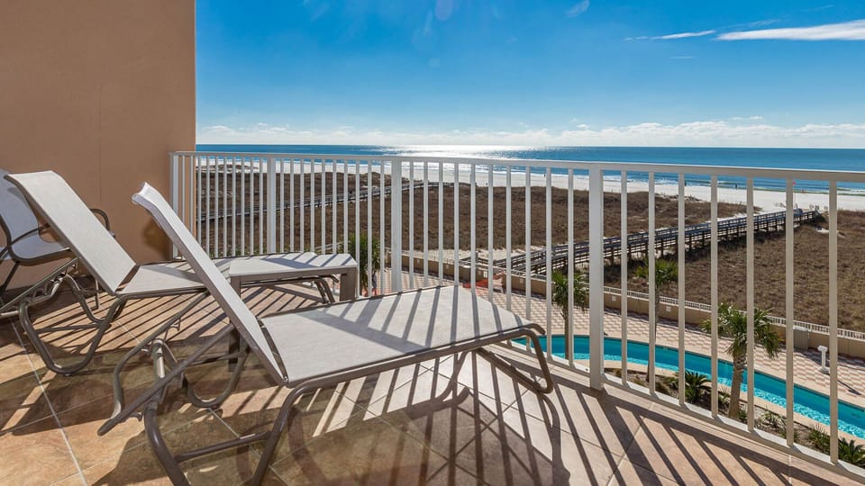 Lounge on your balcony overlooking the stunning gulf coastline and doze to the sound of waves and seagulls