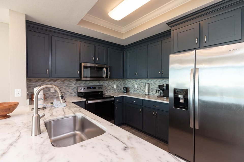 Craft delicious meals in this stylish kitchen, where an elegant design awaits your culinary adventures