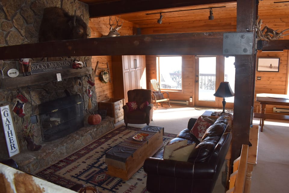 Overlook from 4 step walkup to living room, office space, dining room and kitche