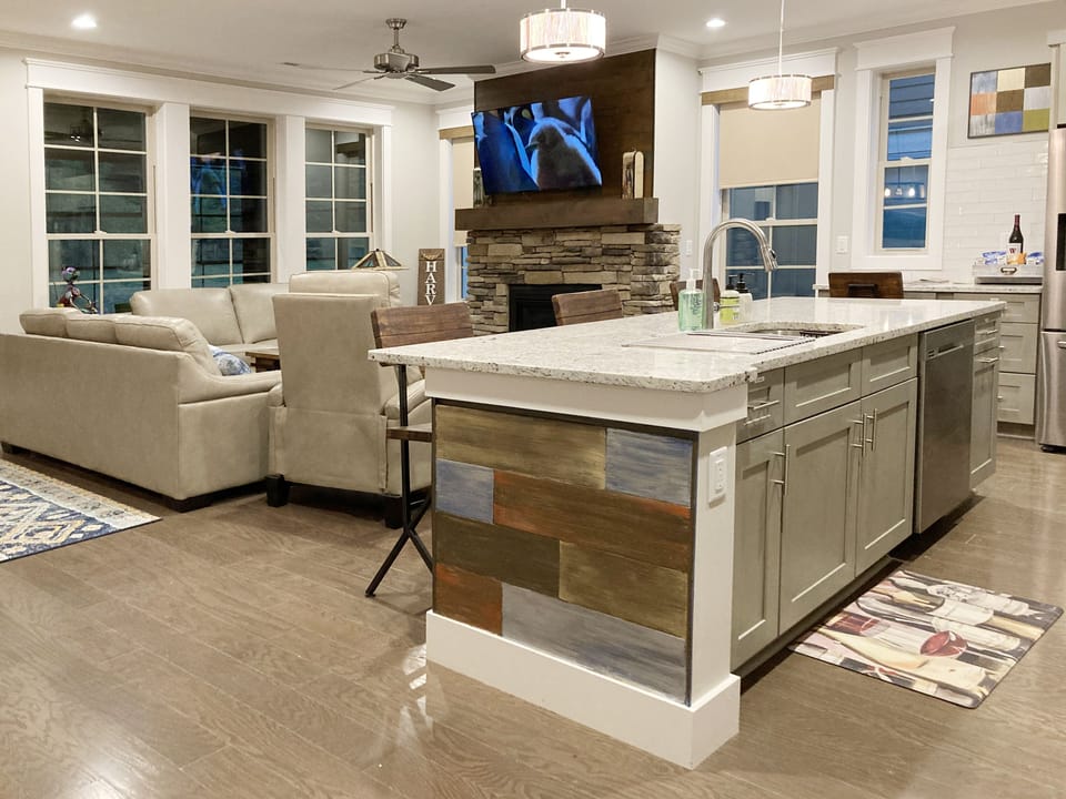 Modern Kitchen and Living Area designed with Rustic Décor. A beautiful pairing.