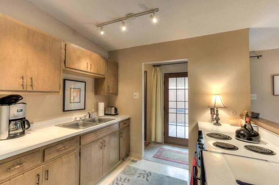 Kitchen with spacious counters for cooking and updated appliances