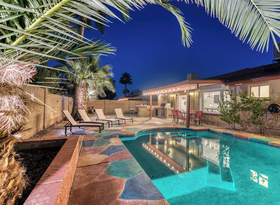 Large private backyard with heated pool.