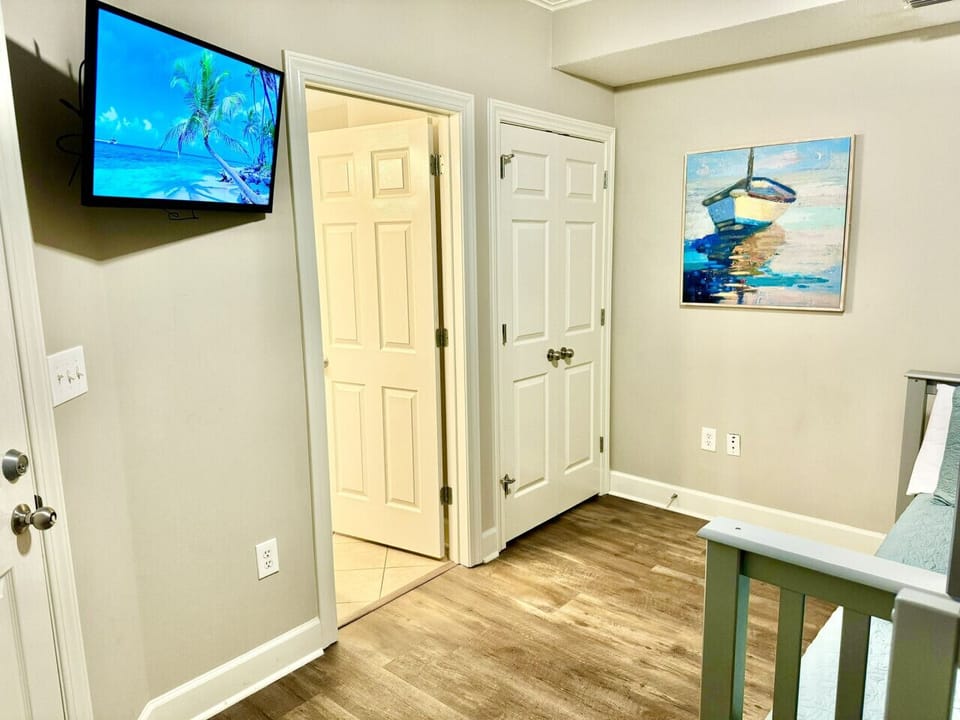 Guest bedroom has its own closet for primary storage and private bath