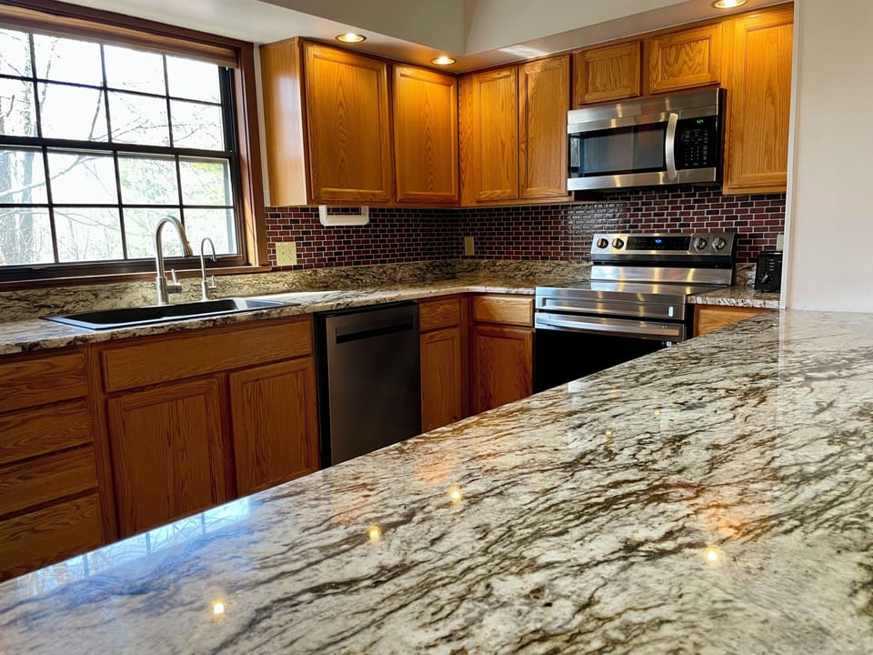 The kitchen includes all the essentials and appliances