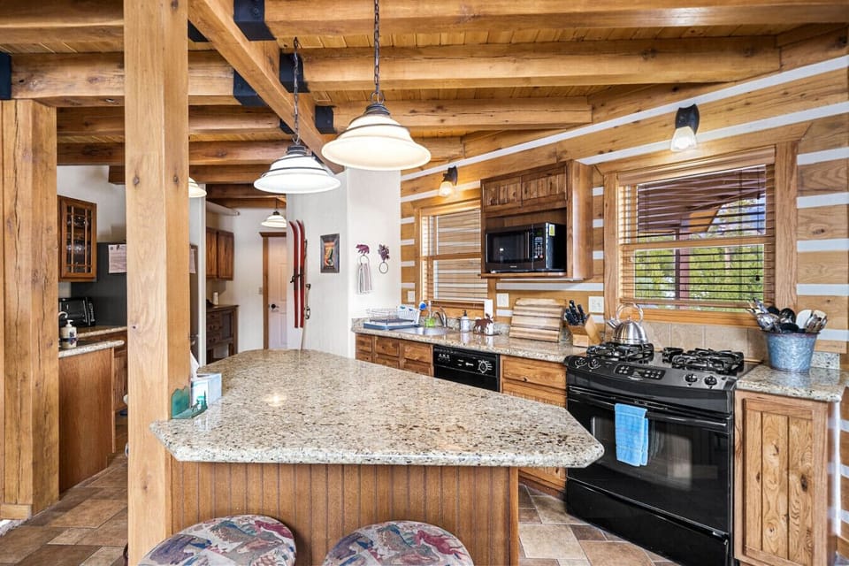 Fully stocked large kitchen and dining area