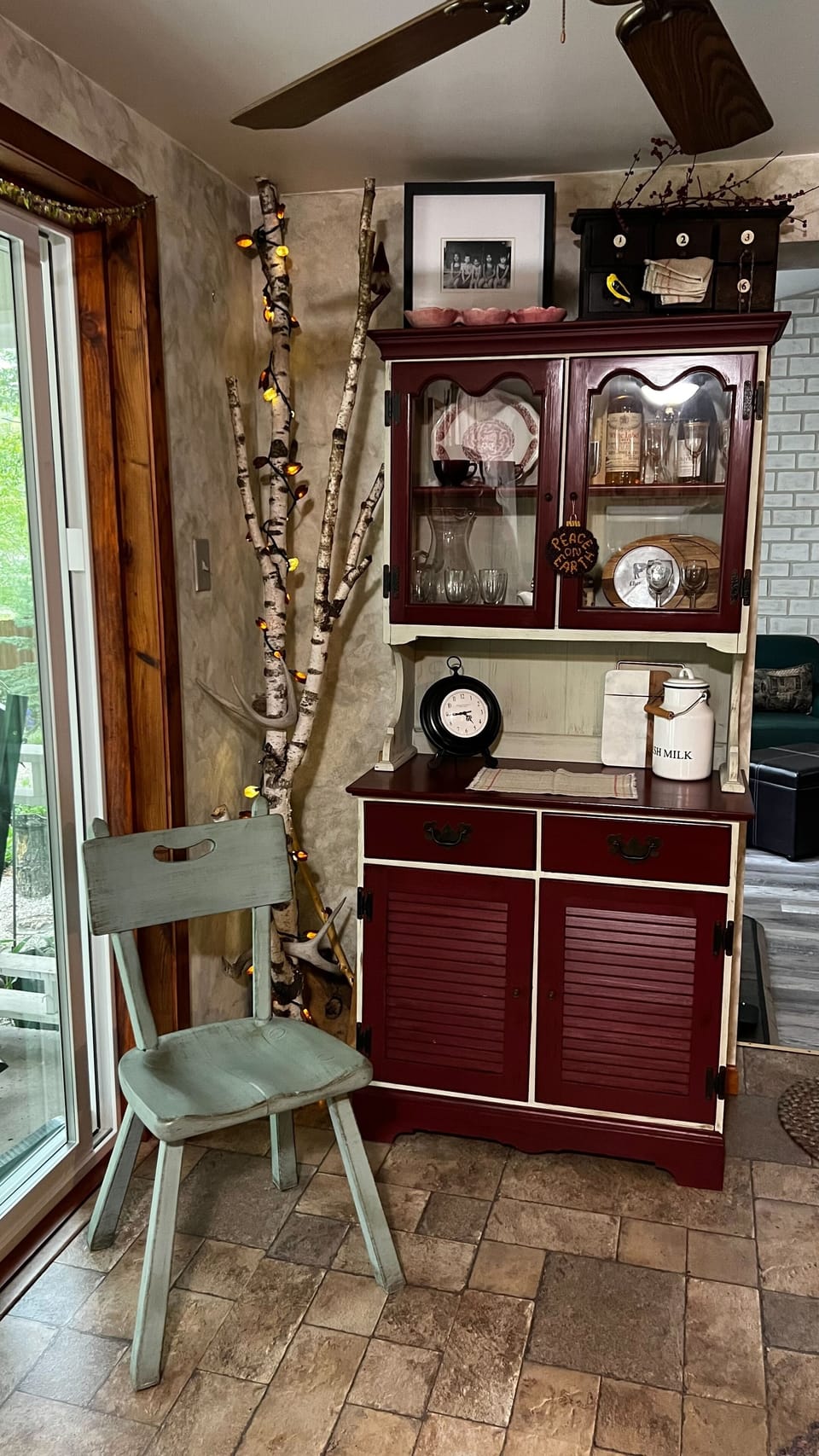 A cute corner of the kitchen near the sliding glass door. 
