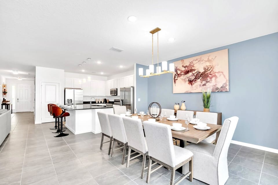 Open Concept Dining Space With Contemporary Lighting And Style