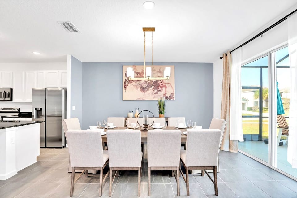 Dining Area Featuring Seating For Ten And Easy Patio Access