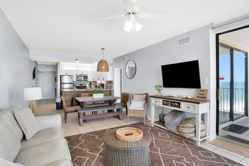 New new new - chairs, paintings, 50" smart TV, rug, coffee table. This condo is just begging for you to come and relax, with plenty of seating.