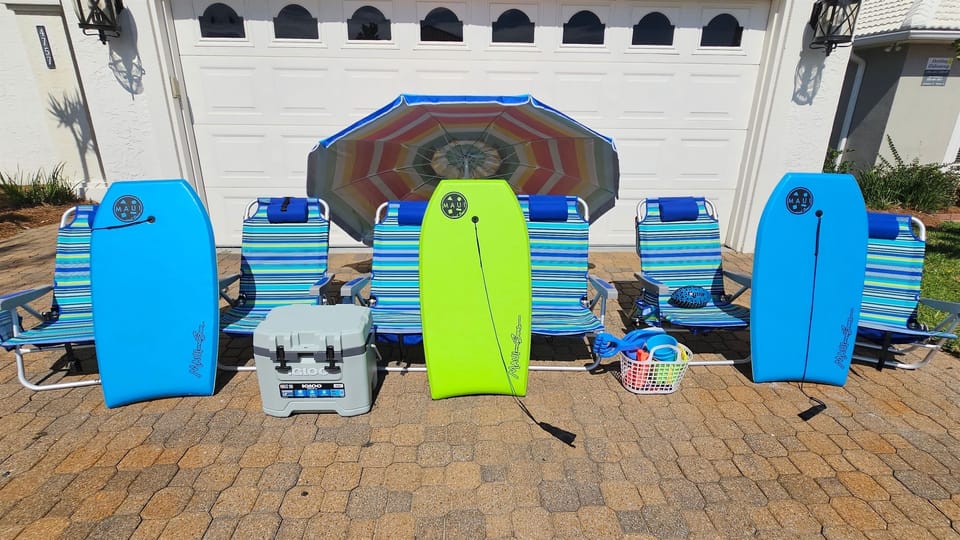 6 Beach Chairs, Umbrella, and Cooler For Perfect Beach Day