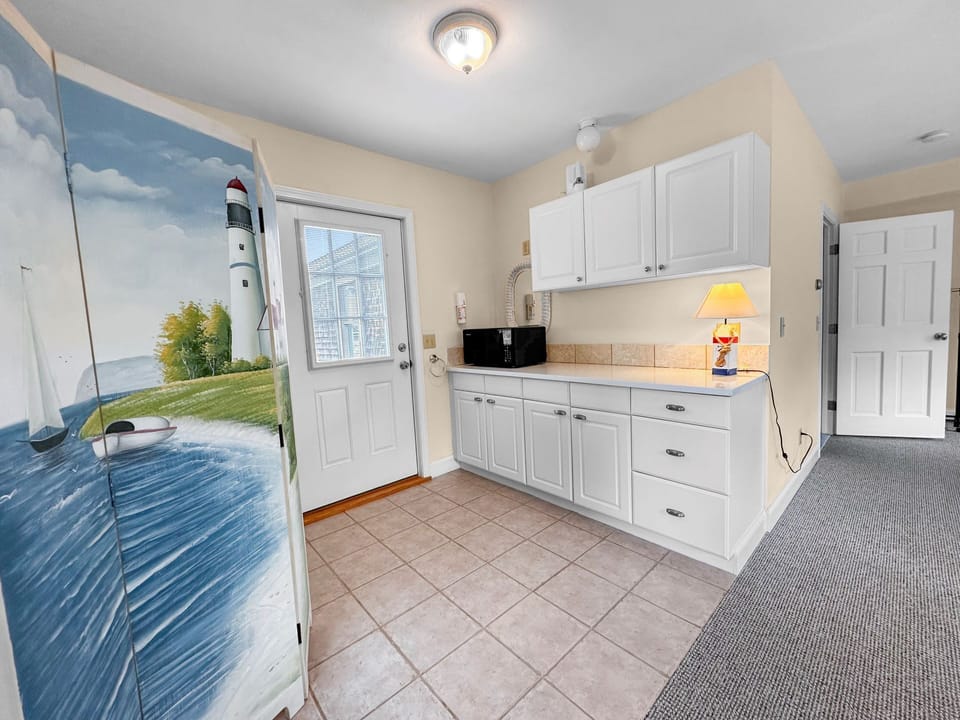 Bedroom #4 - Private escape over garage with small kitchenette (No Fridge)