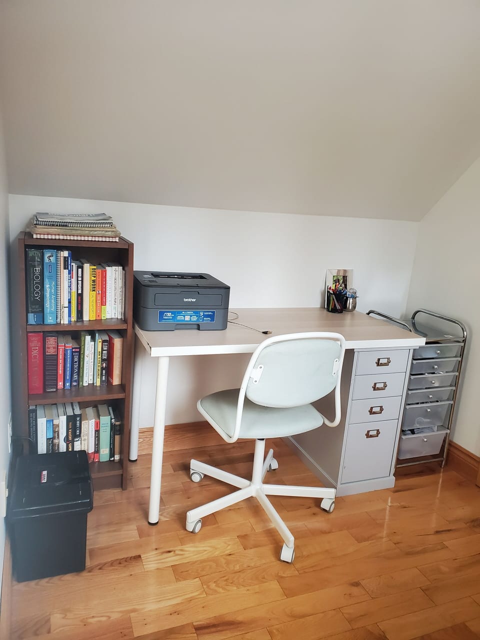 Office area on upper level with desks (one shown) and printer