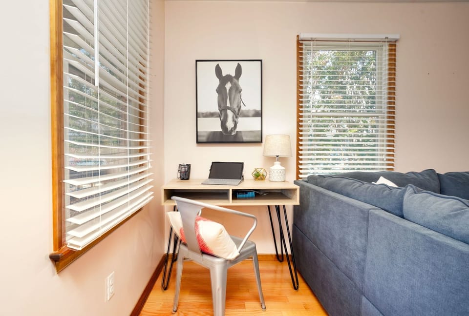 A cozy desk/office area in the family/living room so you don't miss all the fun!