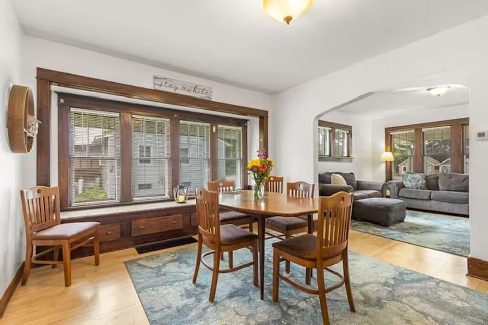 Table can be expanded to seat 6 people.  Window seat stores toys for the kids!