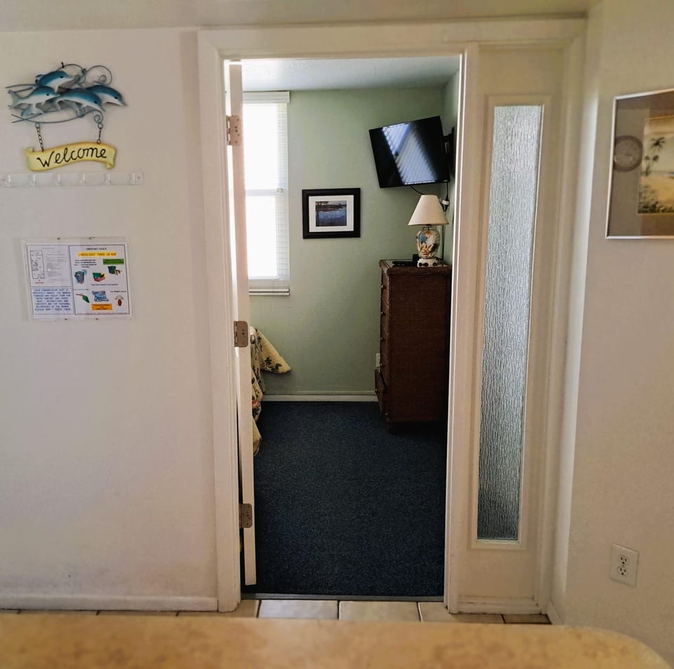 Entryway leading to guest bedroom.