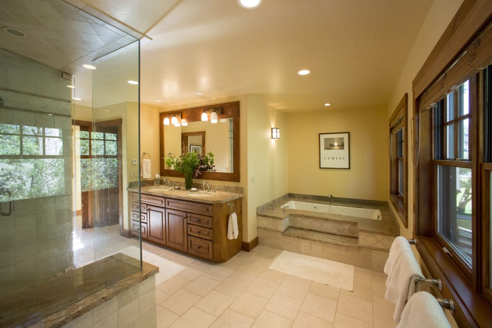 Master Bathroom with steam shower and jacuzzi bath