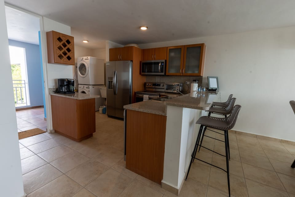 Fully stocked kitchen and full-size washer and dryer. 