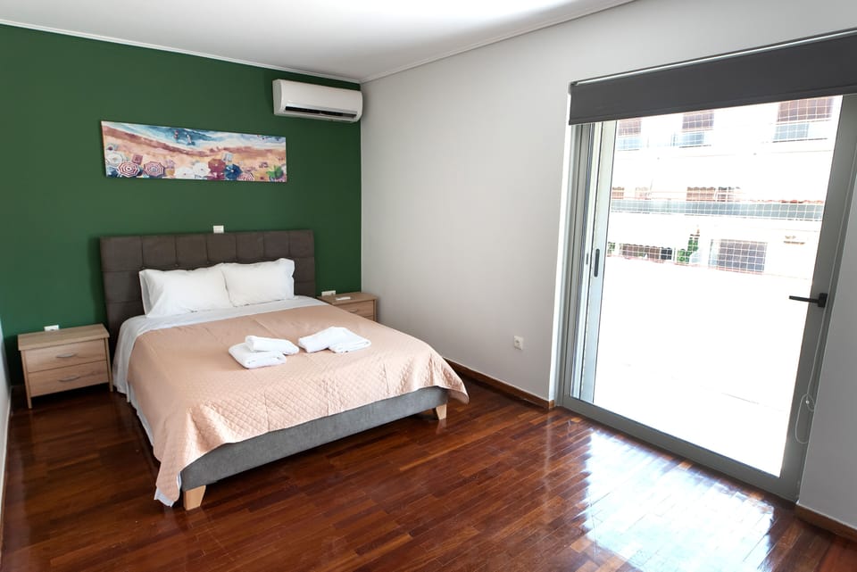 Spacious and designed bedroom with a comfortable double-bed 