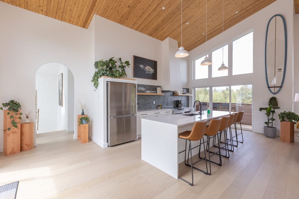 Kitchen: Discover culinary experience in this bright kitchen with modern design and stunning views!