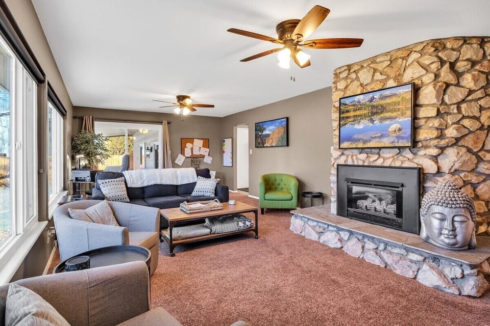 Living room with sofa sleeper for additional guests.. Kids art corner in the back.