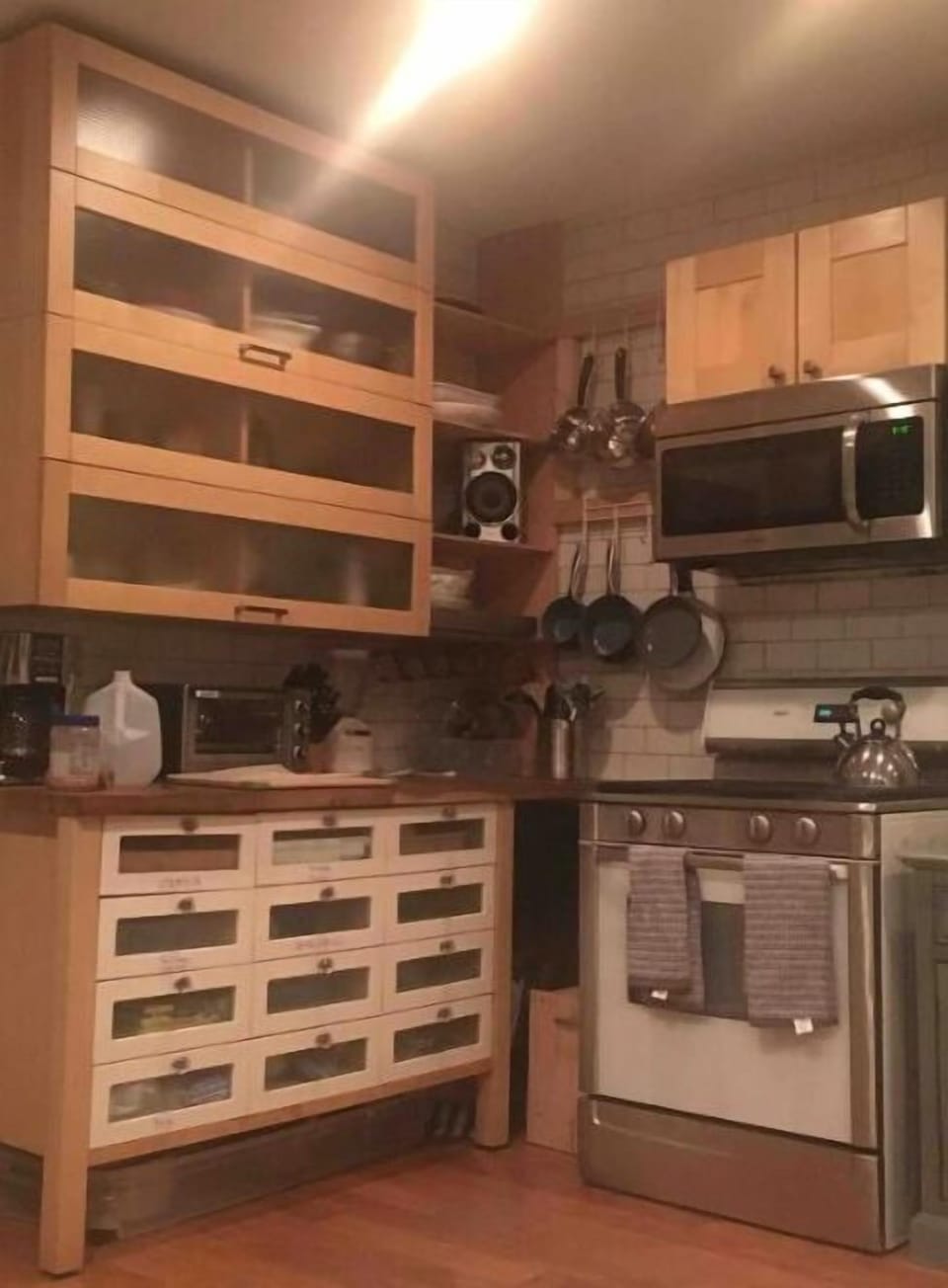 Gourmet Kitchen with professional oven, pots, pans and tools for cooking needs. 