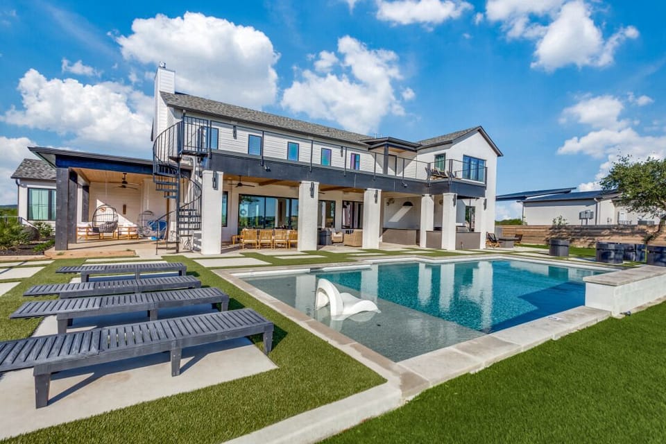 Backyard view + spiral staircase and balcony