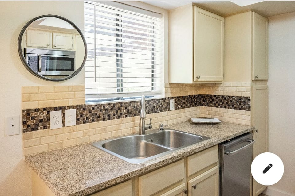 Well Stocked Kitchen with Granite Counters.