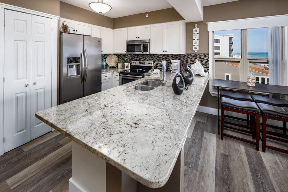 Kitchen - Beautiful counter tops and cabinetry.