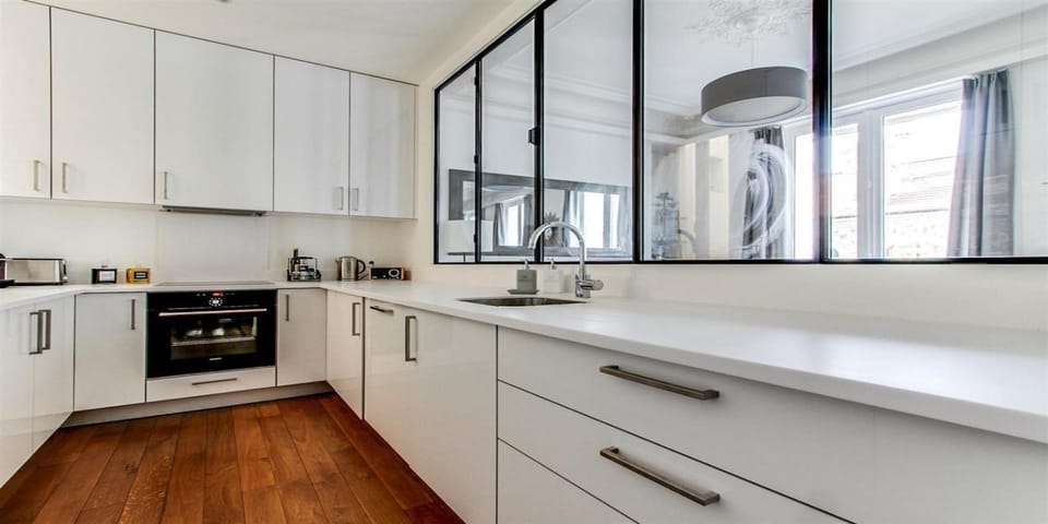 semi-open kitchen view-able by windows
