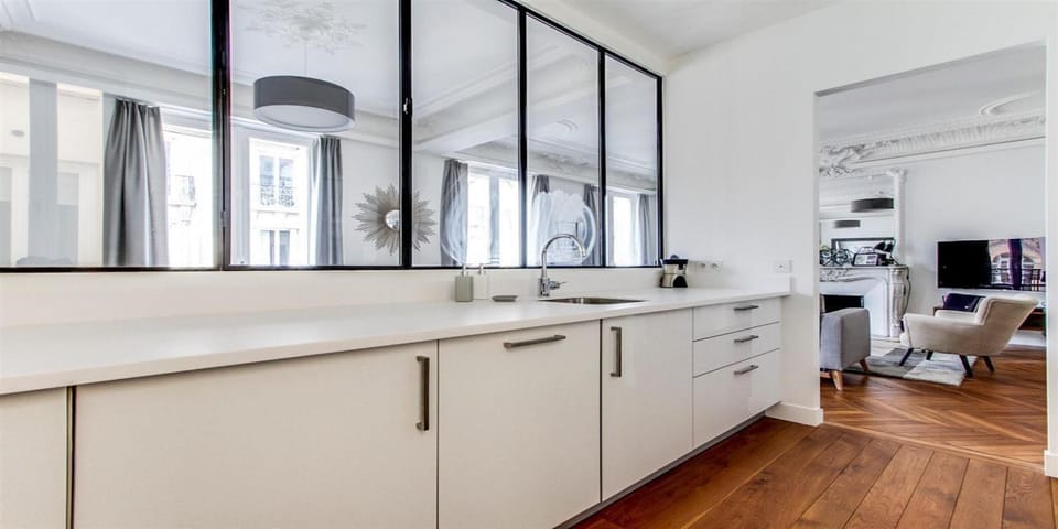 semi-open kitchen view-able by windows